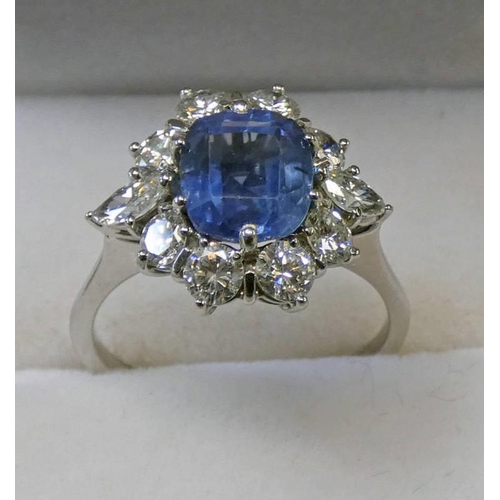 59 - SAPPHIRE & DIAMOND CLUSTER RING, THE CUSHION SHAPED SAPPHIRE WITH A SURROUND OF BRILLIANT & MARQUISE... 