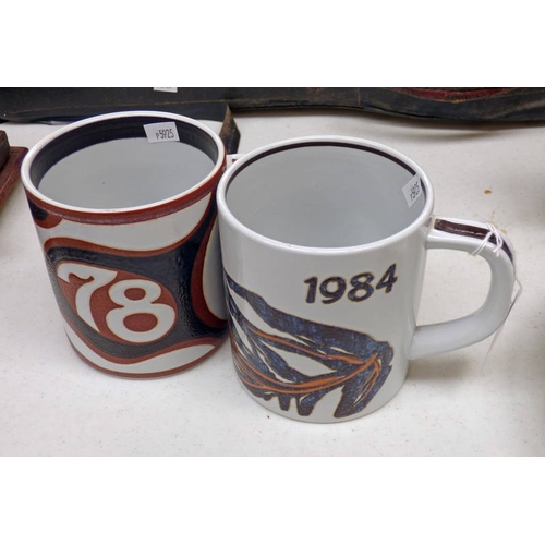 3399 - 3 ROYAL COPENHAGEN FAJANCE MUGS FOR THE YEARS 1969, 1978 AND 1984, EACH WITH SILVER INSERT ON BOTTOM