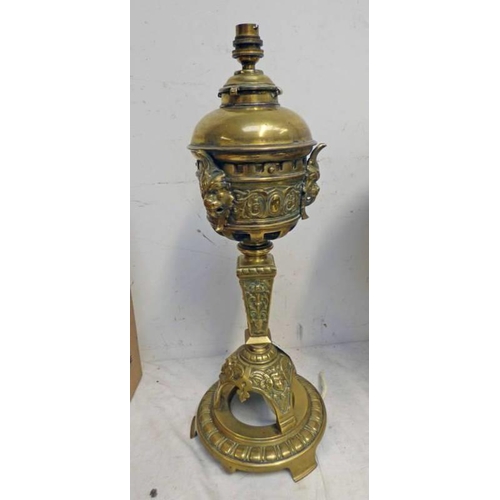 1004 - EARLY 20TH CENTURY BRASS PARAFFIN LAMPS CONVERTED TO ELECTRICITY, DECORATED WITH LION FACES ETC  51 ... 