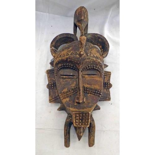 1192 - SENUFO MASK WITH INCISED DECORATION AND SLIT EYES, 50CM HIGH