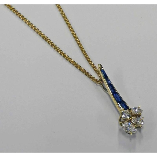 125 - SAPPHIRE & DIAMOND SET PENDANT ON A 9CT GOLD CHAIN, THE MARQUIS & BRILLIANT CUT DIAMONDS ON A GRADUA... 