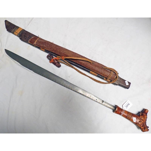 1270 - A MANDAU WITH CARVED WOODEN HILT AND HEAVY BLADE WITH BRASS DOT DECORATION 63CM LONG, CARVED WOODEN ... 