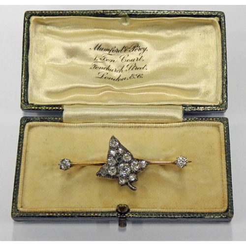 147 - LATE 19TH CENTURY OR EARLY 20TH CENTURY DIAMOND SET LEAF BROOCH THE MIXED CUT DIAMONDS SET ON A BAR ... 