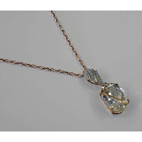 201 - DIAMOND & FACETED RUTILATED QUARTZ PENDANT ON A 9CT GOLD CHAIN