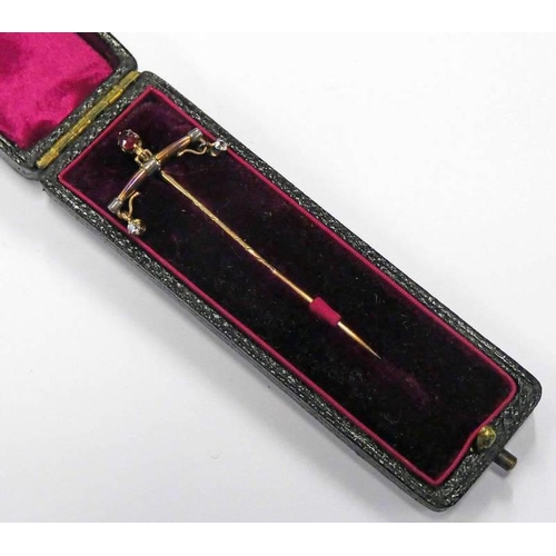 210 - EARLY 20TH CENTURY RUBY & DIAMOND SET STICK PIN, THE DIAMONDS SUSPENDED FROM A BEAM