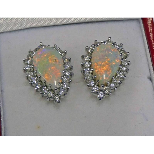 241 - PAIR OF OPAL & DIAMOND CLUSTER EARRINGS EACH PEAR SHAPED OPAL SET WITHIN A SURROUND OF 18 BRILLIANT ... 