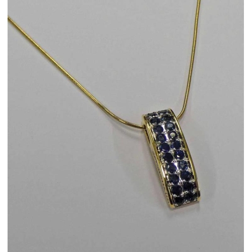 253 - 18CT GOLD SAPPHIRE & DIAMOND SET PENDANT ON AN 18CT GOLD CHAIN