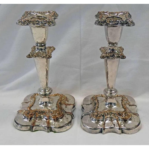 254 - PAIR OF 19TH CENTURY SILVER PLATED CANDLESTICKS ON SHAPED BASES - 18CM TALL