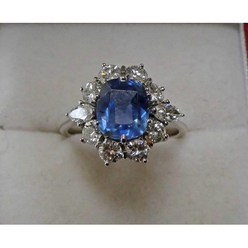 77 - SAPPHIRE & DIAMOND CLUSTER RING, THE CUSHION SHAPED SAPPHIRE WITH A SURROUND OF BRILLIANT & MARQUISE... 