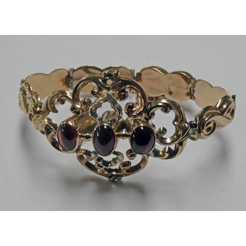 91 - MID 19TH CENTURY GOLD SCROLL WORK BRACELET SET WITH 3 CABOCHON GARNETS - 18.5CM LONG - 20 G