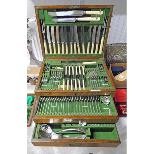 50 - BRASS BOUND OAK CAMPAIGN CANTEEN CABINET WITH A 12 PLACE SILVER PLATED CUTLERY SET