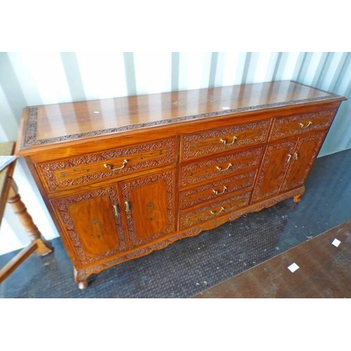 5009 - HARDWOOD EASTERN SIDEBOARD WITH DECORATIVE BRASS INLAY AND CARVED FLORAL DECORATION WITH 4 CENTRALLY... 