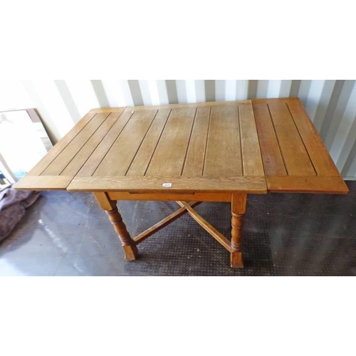 5012 - EARLY 20TH CENTURY OAK PULL-OUT TABLE ON TURNED SUPPORTS, LENGTH 152CM