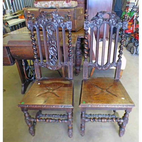 5017 - PAIR OF LATE 19TH CENTURY OAK HALL CHAIRS WITH CARVED GRAPE DECORATION ON BARLEY TWIST SUPPORTS