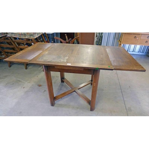 5032 - OAK EXTENDING TABLE ON SQUARE SUPPORTS, LENGTH 151 CM