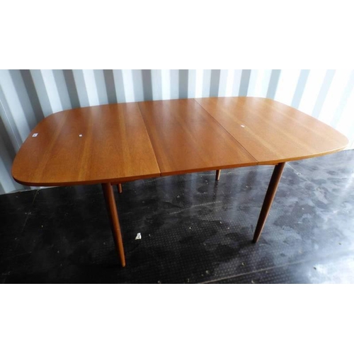 5045 - TEAK G-PLAN PULL-OUT DINING TABLE ON TAPERED SUPPORTS, LENGTH 171CM