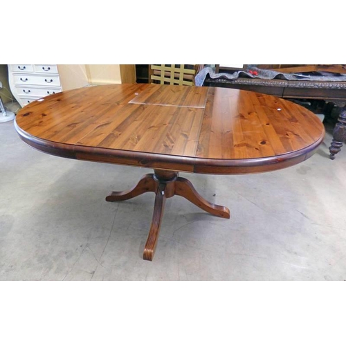 5050 - DUCAL PINE PULLOUT PEDESTAL TABLE WITH 4 SHAPED SUPPORTS.  LENGTH 155 CM