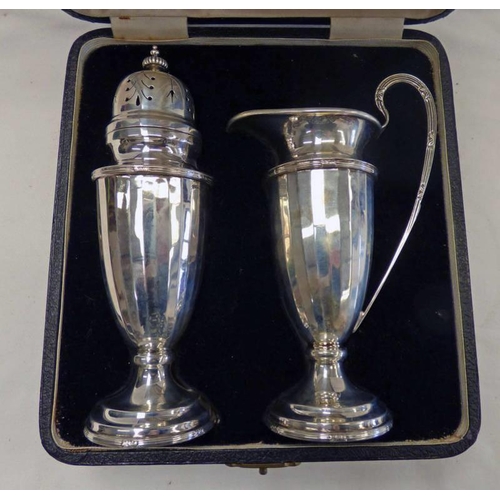 6 - CASED SILVER SUGAR CASTOR & CREAM JUG WITH PANELLED SIDES ON CIRCULAR BASES BY WALKER & HALL SHEFFIE... 