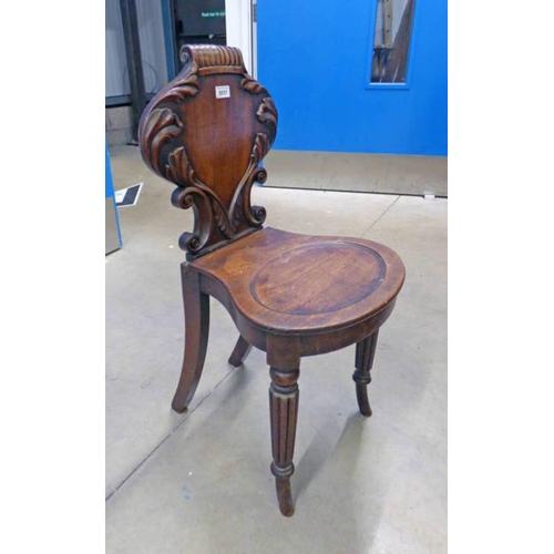 141 - 19TH CENTURY MAHOGANY HALL CHAIR ON REEDED SUPPORTS