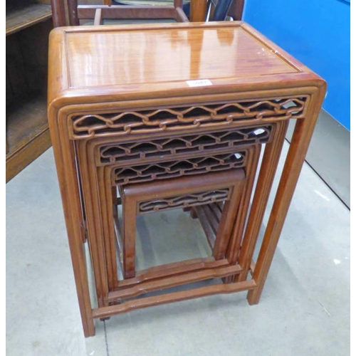 145 - NEST OF 4 ORIENTAL HARDWOOD TABLES