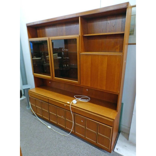 189 - 20TH CENTURY TEAK UNIT WITH 3 DRAWERS OVER 3 PANEL DOORS OVER BASE WITH 2 SHELVES OVER 3 PANEL DOORS... 