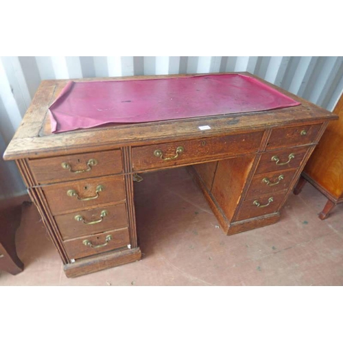59 - 19TH CENTURY OAK KNEEHOLE DESK WITH CENTRALLY SET DRAWER FLANKED BY 2 COLUMNS OF 4 DRAWERS