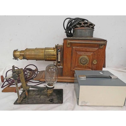 1633 - MAGIC LANTERN WITH GILT METAL EXTENDING LENS ON A WOOD AND METAL BODY, COMES WITH OLD BULB AND MODER... 