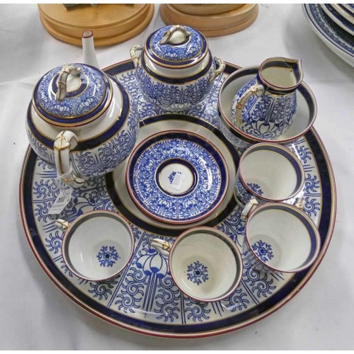 3004 - ROYAL WORCESTER BLUE, WHITE & GILT BREAKFAST SET ON A  CIRCULAR TRAY