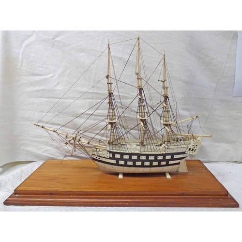 1041 - 19TH CENTURY FRENCH NAPOLEONIC PRISONER OF WAR BONE MODEL OF A 3 MASTED 30 GUN SHIP, THE HULL PLANKE... 