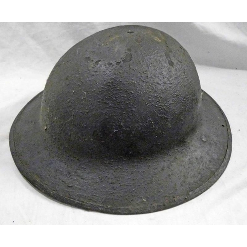 1056 - BRITISH BRODIE HELMET WITH MARKINGS TO SHELL, LEATHER LINER & LEATHER CHIN STRAP