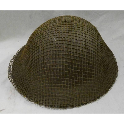 1161 - WORLD WAR TWO 1941 DATED BRITISH BRODIE HELMET WITH LINER, CANVAS CHIN STRAP & NET