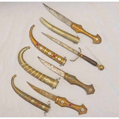 1186 - 4 MIDDLE EASTERN DAGGERS WITH METAL DECORATION -4-