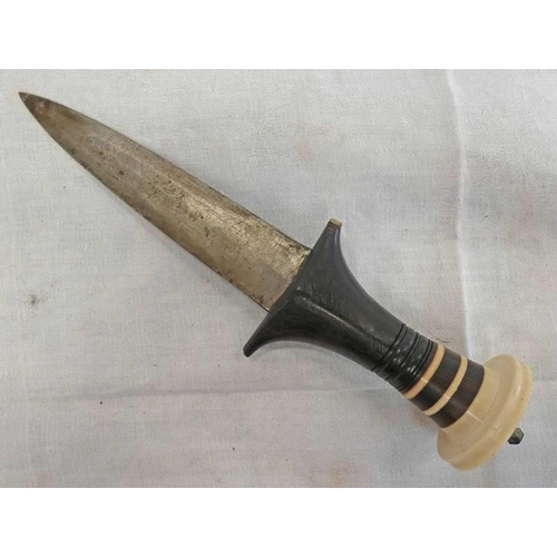 1234 - AFRICAN DAGGER WITH 15.9CM LONG DOUBLE EDGED BLADE WITH CARVED WOODEN GRIP & WHITE METAL POMMEL