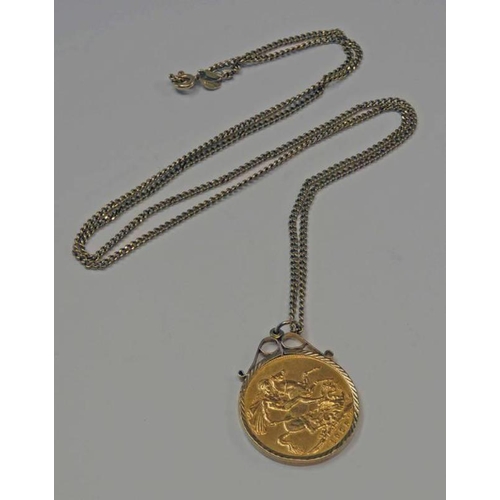 126 - PRETORIA MINT SOVEREIGN IN A 9CT GOLD MOUNT ON A 9CT GOLD CHAIN - 13.3G