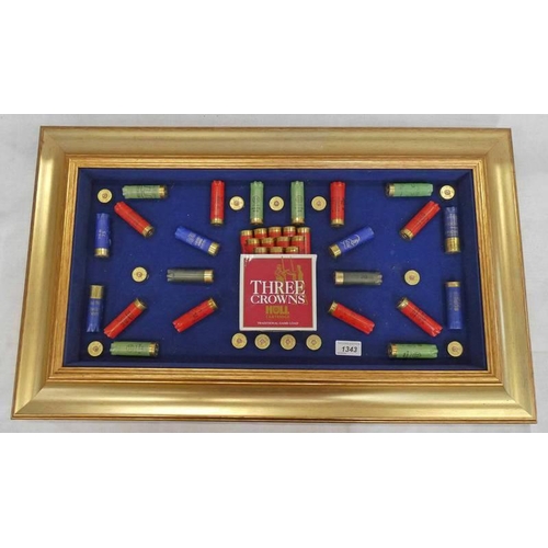 1343 - GILT FRAMED INERT SHOTGUN SHELL DISPLAY