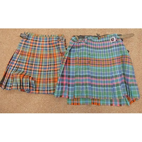 1442 - 2 TARTAN KILTS