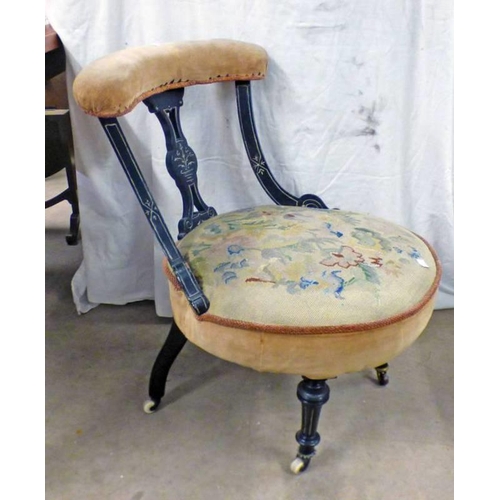 5031 - 19TH CENTURY EBONISED NURSING CHAIR WITH DECORATIVE CARVING ON REEDED SUPPORTS