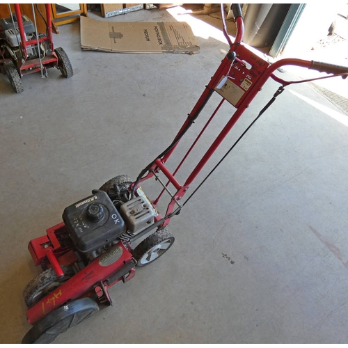 6088 - BUSHRANGER EDGER 4 STOKE LAWN EDGING MACHINE **THIS LOT WILL BE SOLD + VAT ON THE HAMMER**