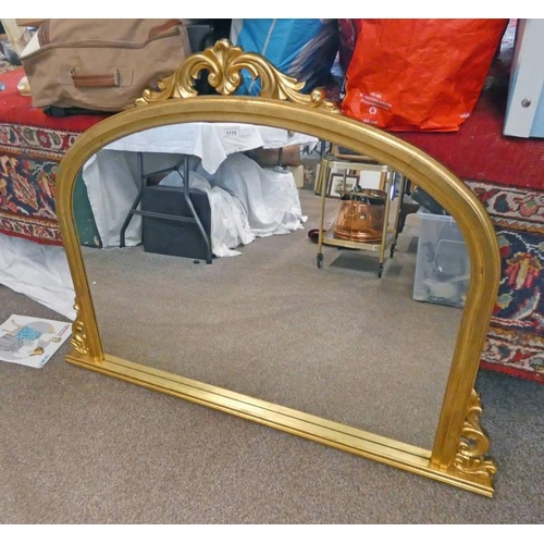 1115 - GILT OVER MANTLE MIRROR WITH CARVED DECORATION TO TOP & SIDES, 152 X 92 CM