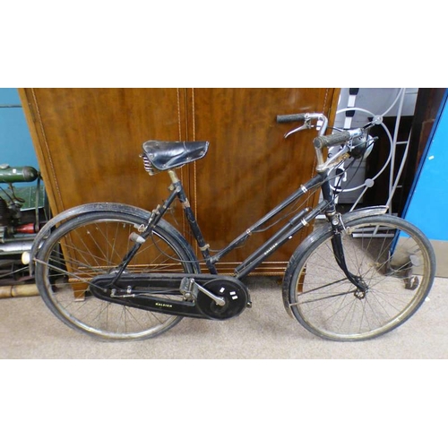 120W - RALEIGH BIKE WITH SPRING SADDLE SEAT MARKED BROOKS