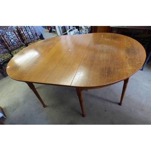 131 - OAK D-END DINING TABLE WITH LEAF ON TURNED SUPPORTS. LENGTH 196 CM