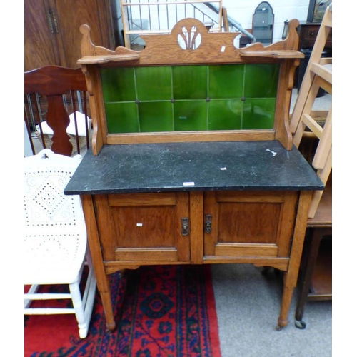 198 - EARLY 20TH CENTURY OAK MARBLE TOPPED WASH STAND WITH TILE INSET GALLERY TOP OVER BASE OF 2 PANEL DOO... 