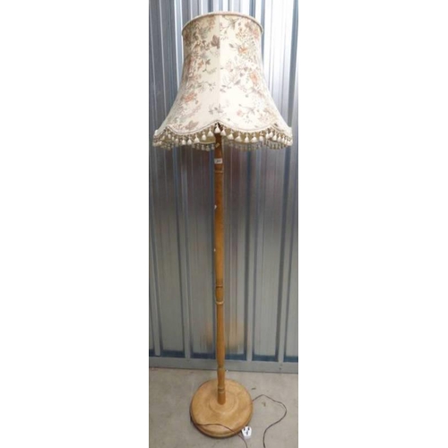 213 - OAK STANDARD LAMP WITH TURNED COLUMN