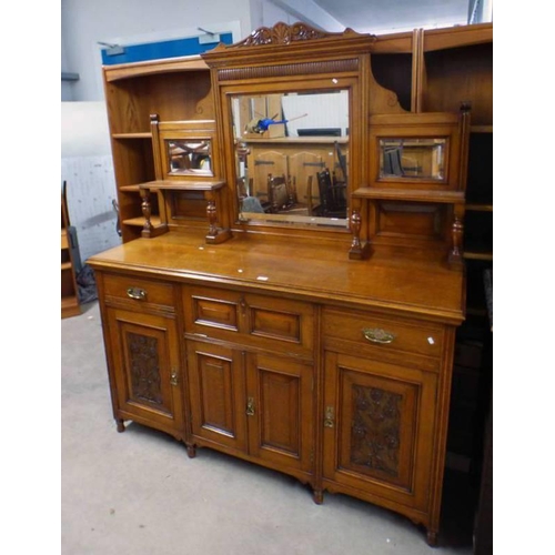 25 - LATE 19TH CENTURY OAK MIRROR BACK SIDEBOARD WITH FALL FRONT PANEL DOOR FLANKED BY 2 DRAWERS OVER 4 P... 