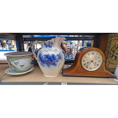 3089 - MAHOGANY CASED MANTLE CLOCK TOGETHER WITH DECORATIVE PLANT POT AND EWER OVER ONE SHELF