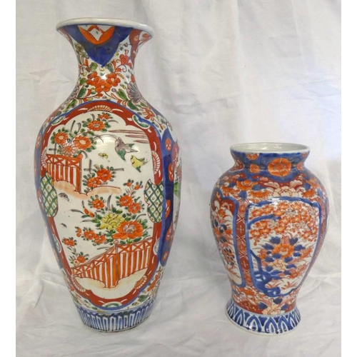 3153 - TWO ORIENTAL IMARI VASES WITH FLORAL DECORATION . TALLEST 40 CM