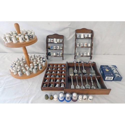 3160A - LARGE SELECTION THIMBLES ON STANDS, CUTLERY ON STAND ETC