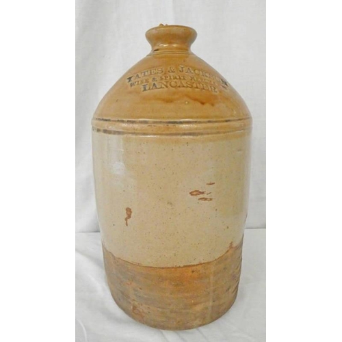 3199 - STONEWARE FLAGON MARKED YATES & JACKSON, WINE & SPIRIT MERCHANTS, LANCASTER, HEIGHT - 40CM TALL