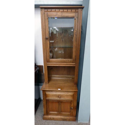 40 - ERCOL ELM CABINET WITH GLASS PANEL DOOR OVER BASE OF DRAWER OVER PANEL DOOR, WIDTH 63CM X HEIGHT 196... 