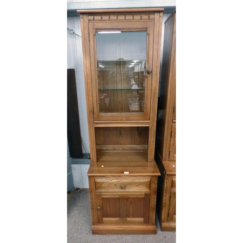 41 - ERCOL ELM CABINET WITH GLASS PANEL DOOR OVER BASE OF DRAWER OVER PANEL DOOR, WIDTH 63CM X HEIGHT 196... 